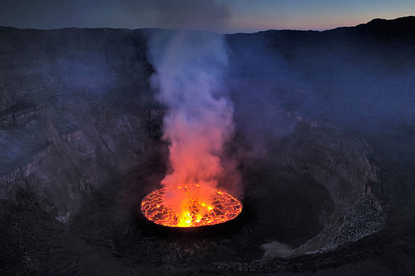 The-Nyiragongo-Crater-in-the-Democratic-Republic-of-Congo-is-the-world's-largest-lava-lake,-one-of-the-wonders-of-the-African-continent.-The-crater-bubbles-1,300-feet-deep
