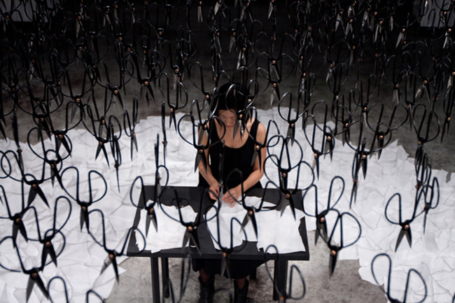 Underneath Hundreds of Suspended Scissors artist Beili Liu Embroiders