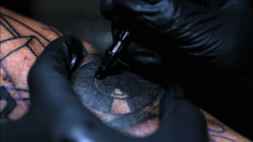 An Incredible Slow Motion Video of a Tattoo Artist Working