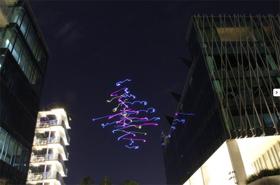 Swarming Drones Make 3D Light Art in the Sky